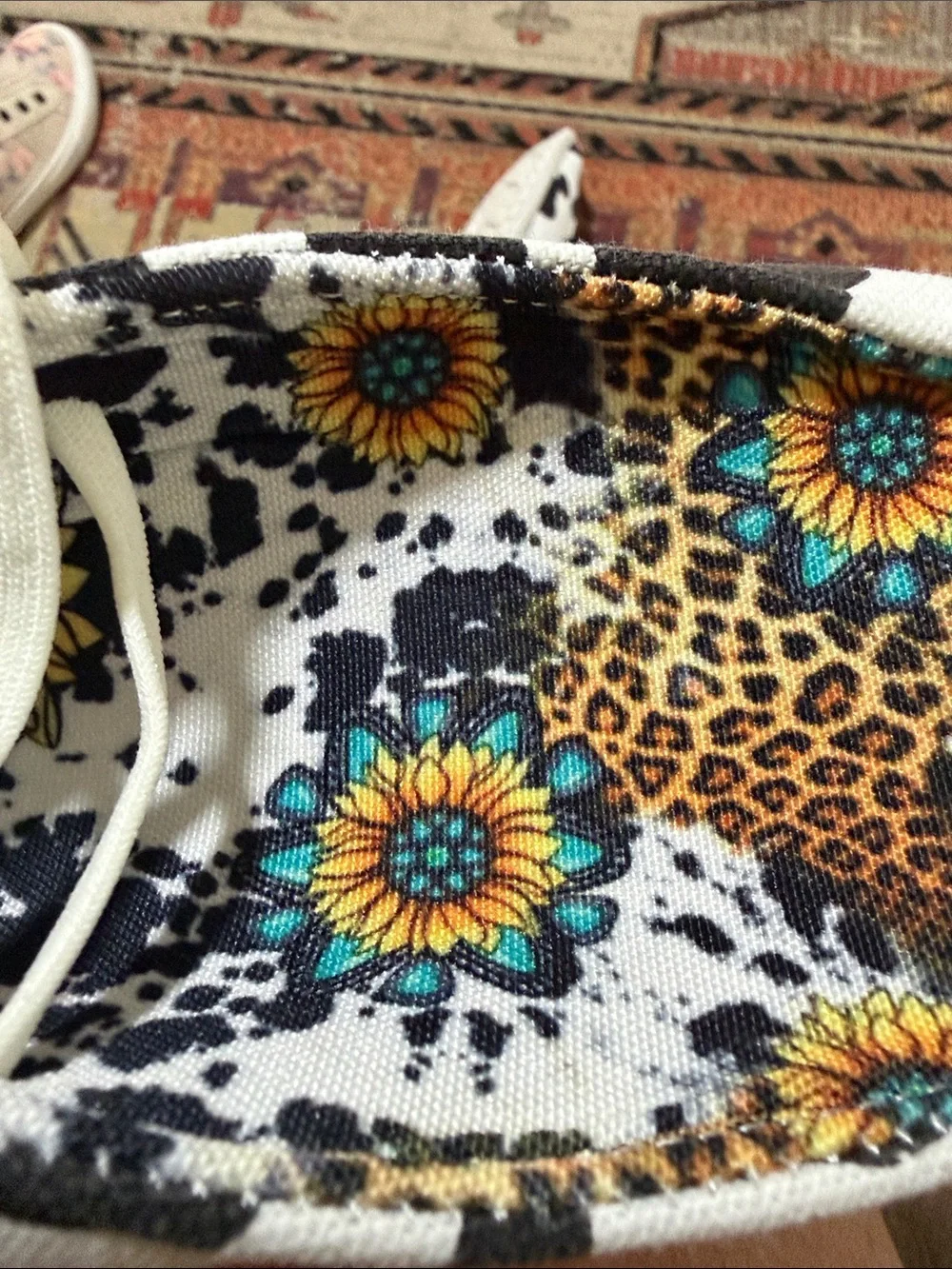 Women’s White & Black Cow Print Slip-On Sneakers with Sunflower Lining